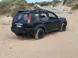 018FF36B_KS-XTRAIL-LHS-ANGLE-BEACH-scaled-1-5.webp