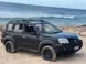6C891428_KS-XTRAIL-LHS-FRONR-ANGLE-BEACH-scaled-1-5.webp